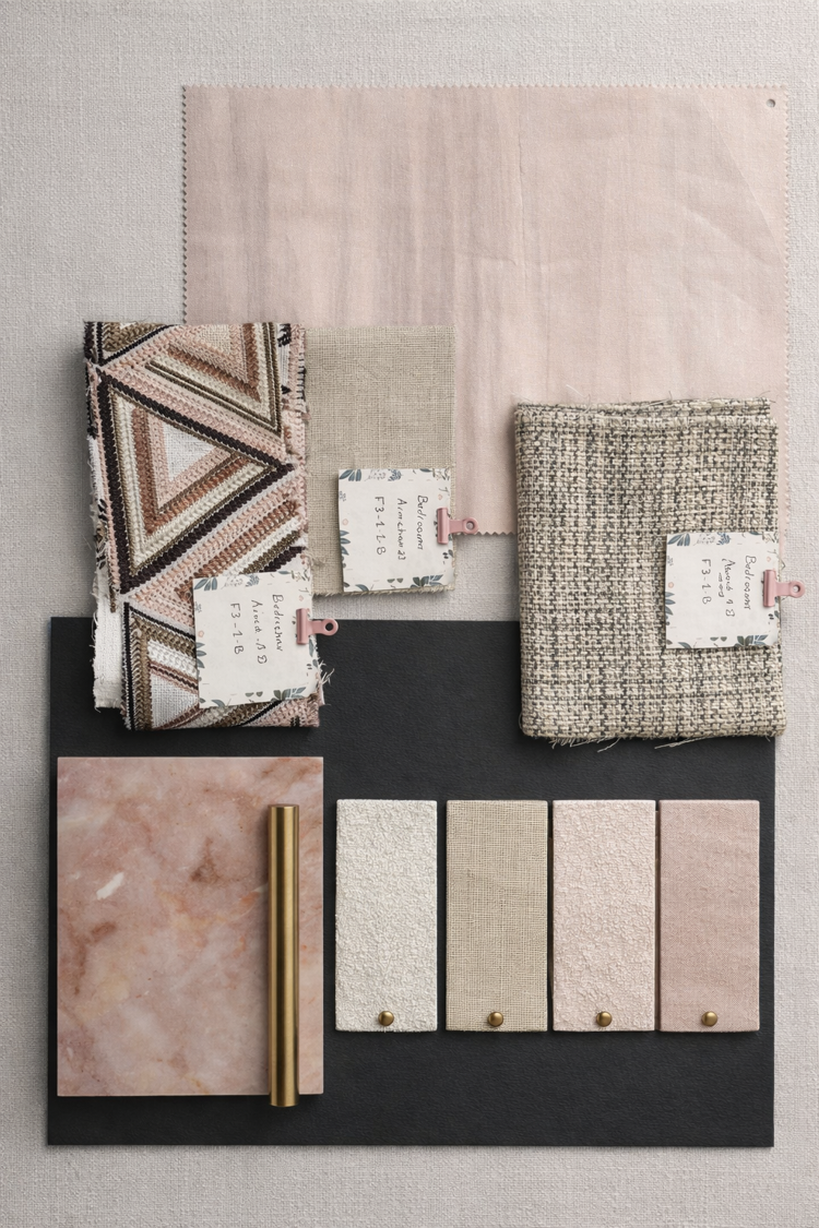 Blush and charcoal material palette for the bedroom suite